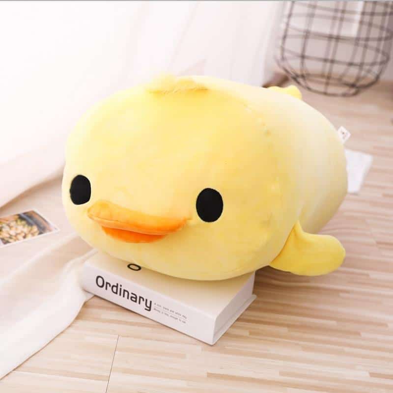 Peluche oreiller canard couché