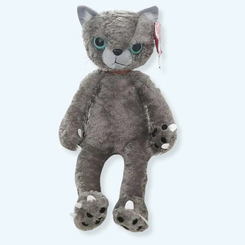 Peluche chat beige mécontent assis