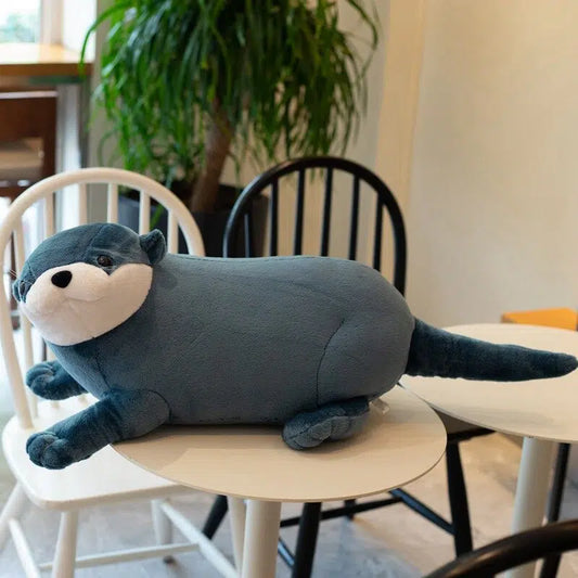 Peluche loutre bleu