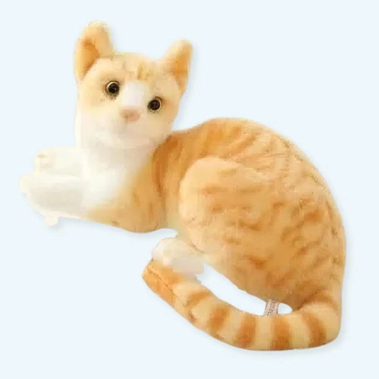 Peluche chat tigré orange couché