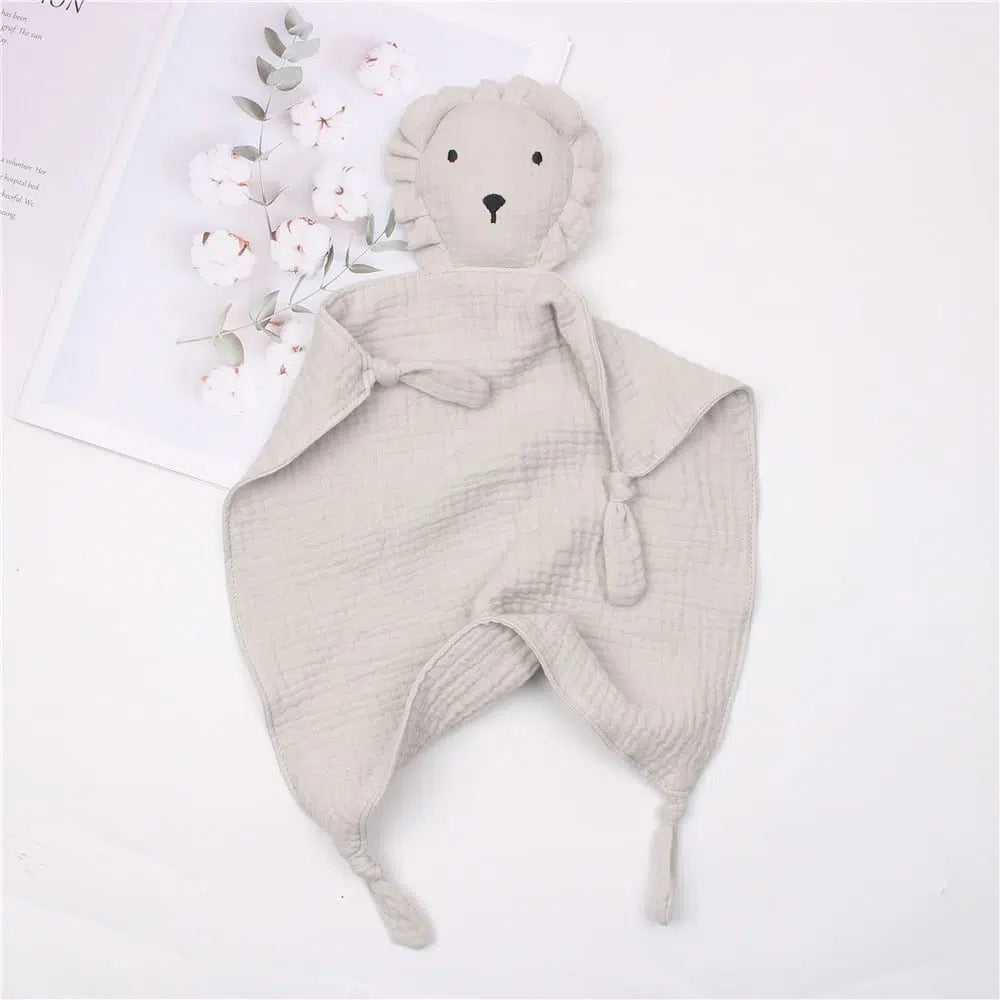 Doudou lion en mousseline et coton
