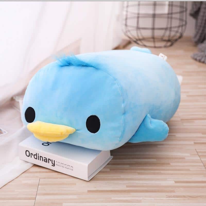Peluche oreiller canard couché