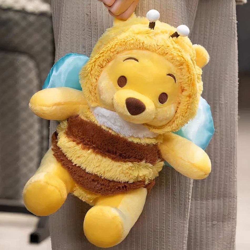 Peluche Winnie l’ourson en abeille